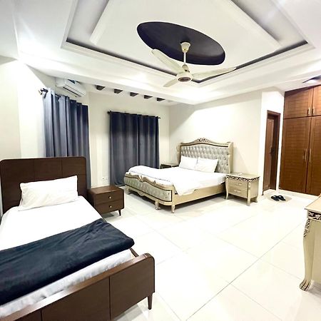Luxury Apartment Rentals Исламабад Экстерьер фото