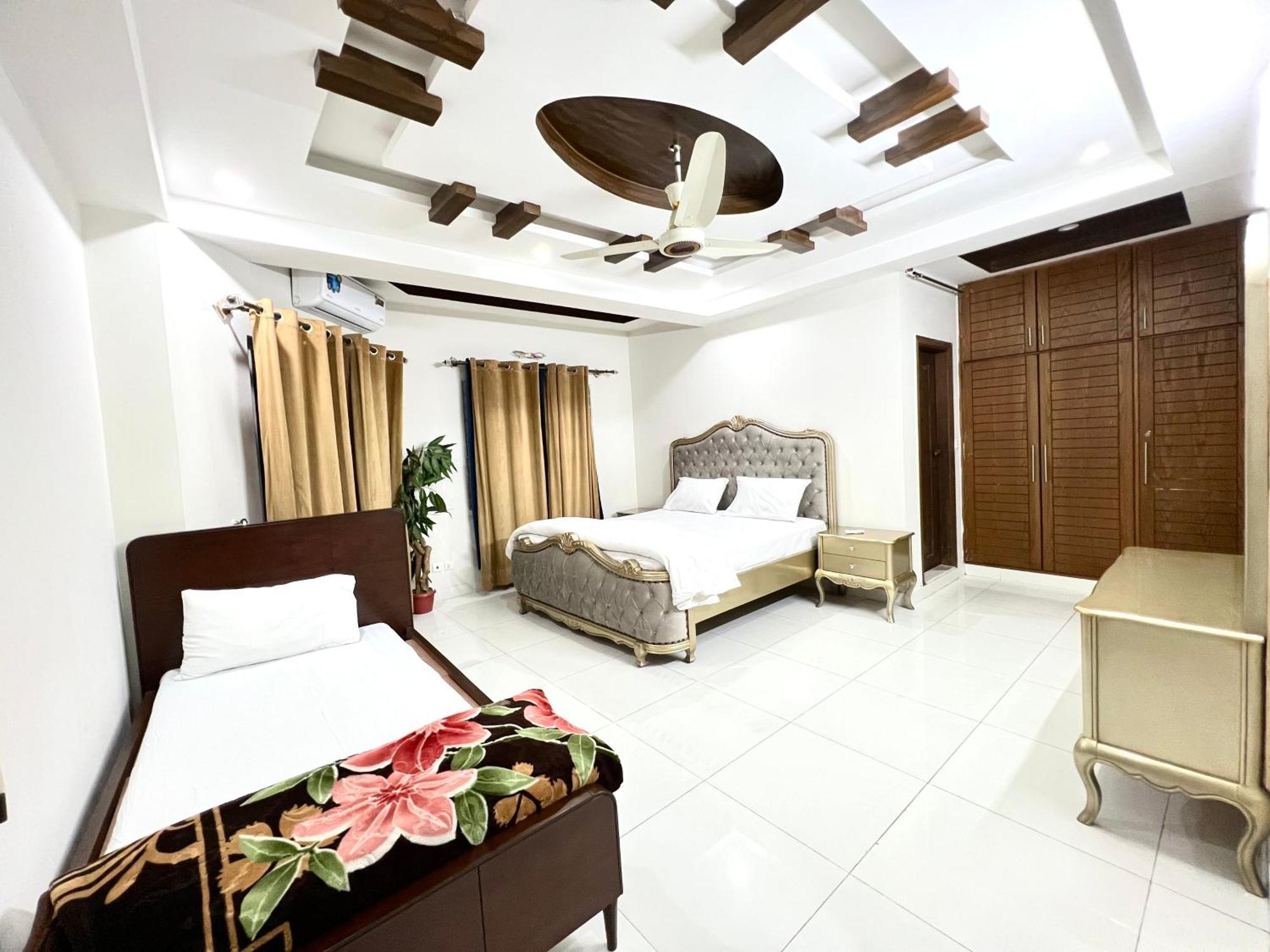 Luxury Apartment Rentals Исламабад Экстерьер фото